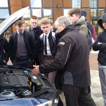 Students learn car maintenance with Kwik Fit
